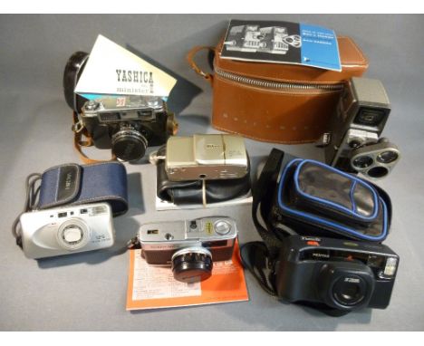 SIX CAMERAS INCLUDING OLYMPUS TRIP 35 mm, YASHICA MODEL II MINISTER (CASED), BELL & HOWELL ELECTRIC EYE 8mm CAMERA (CASED)