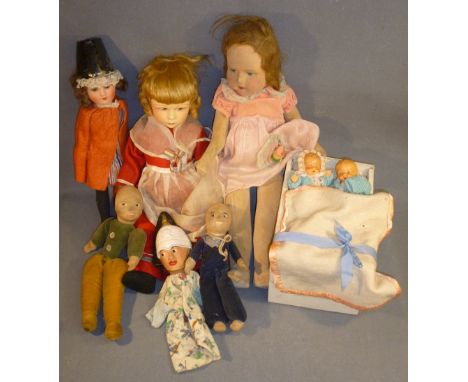 A GROUP OF SEVEN DOLLS COMPRISING TWO BY NORA WELLINGS (ONE 'JOLLY SAILOR'), A GERMAN DOLL BY ARMAND MARSEILLE 390 A. 7/0 M (