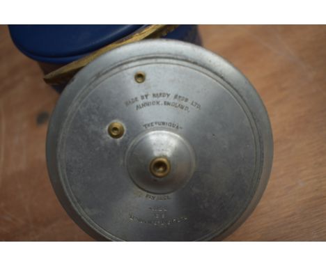 A vintage Hardy fly reel called 'THE UNIQUA' duplicated mk 2 size 3 &amp; 3/4' with a brass foot to the reel and in a blue Ha