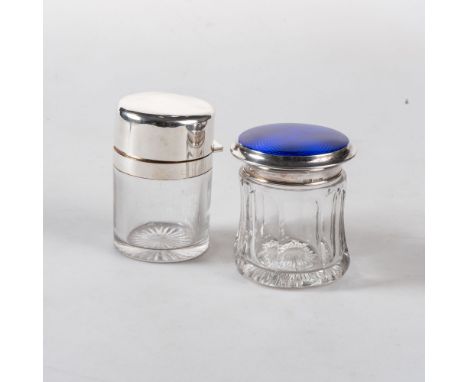 Maker?s mark V&T, Birmingham 1927, cylindrical with panelled sides, the lid with blue guilloche enamel decoration, 10cm high;