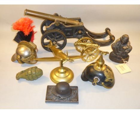 CAST IRON AND BRASS MINIATURE CANNON (L: 44.5 cm OVERALL), BRASS SPITFIRE, GERMAN WORLD WAR ONE STYLE PAPERWEIGHT WITH HELMET