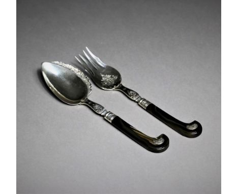 A Dutch silver ginger spoon and fork, by J.A. LintveldAmsterdam, 1852engraved with floral decorations with agate 'pistol' gri