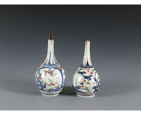 Two Imari bottle vasesJapan, Arita circa 1700of ovoid shape with a very slender neck, decorated in underglaze blue, iron red 