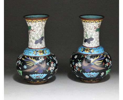 A pair of cloisonné enamel vasesJapan, Meiji periodOf rounded from with long slender neck tapering toward the rim, decorated 