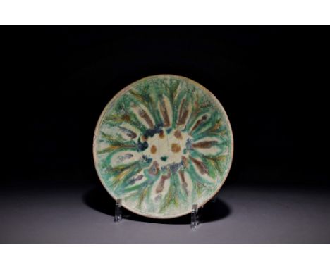 A Sgraffito Splashware Pottery Bowl,Persia, 10th/11th centuryThe earthenware body incised with leaf, scroll and geometric mot