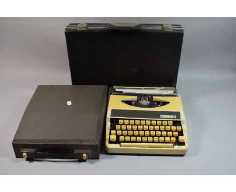 A Vintage Personal Touch Manual Typewriter and Vintage Briefcase 