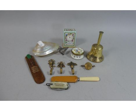 A Tray of Curios to Include Enamelled Trinket Box, Enamelled Halcyon Days Miniature Clock, Brass Bell, Pen and Fruit Knife, B