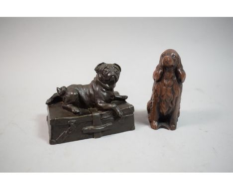 A Bronze Effect Resin Figure of a Pug Dog on Suitcase Together with a Seated Spaniel 