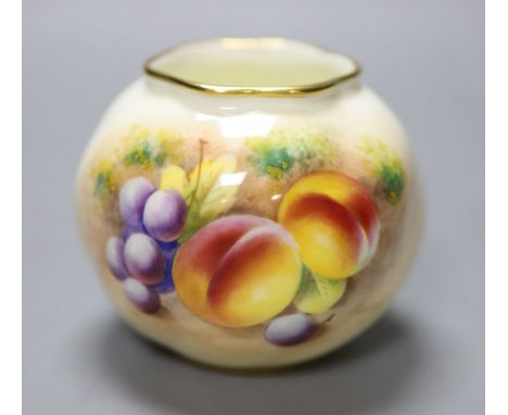 A Royal Worcester spirally moulded globular vase painted with fruits by Roberts, date code for 1955, height 7cm