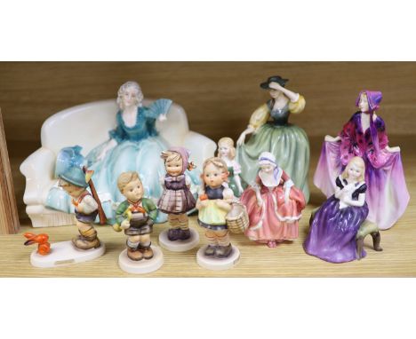 A collection of Hummel figures and Doulton ladies and a Katzhutte figure on a settee