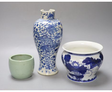 A Chinese blue and white dragon vase with Kangxi mark, together with a blue and white jardiniere and a celadon glazed bowl