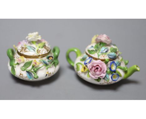 A mid 19th century Minton or Bevington miniature teapot and cover, and matching sucrier and cover, blue cross batons mark to 