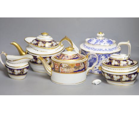 Three various porcelain teapots, a cream jug and a sucrier