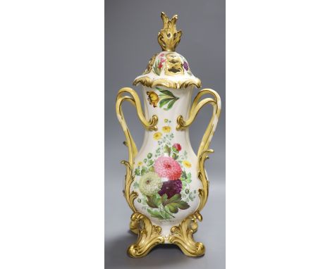 A Victorian porcelain floral painted vase and cover (a.f.), height 44cmCONDITION: English bone china, all 4 handles noticeabl