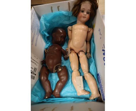 A Simon &amp; Halbig bisque head jointed composition girl doll, H 22in and a jointed composition black doll (very a.f.)CONDIT