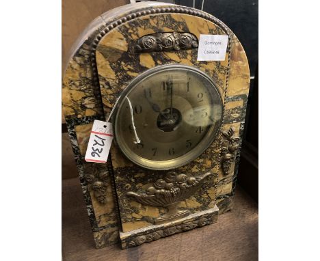 A Bulle black and ochre marble cased electric mantel clock, height 38cm
