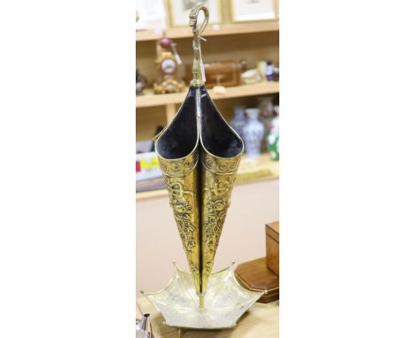 A Dutch brass embossed parasol shaped stick stand, height 91cm