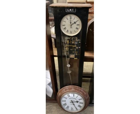 A Synchronome electric oak cased pendulum master clock, height 128cm and a Synchronome electric painted metal circular slave 