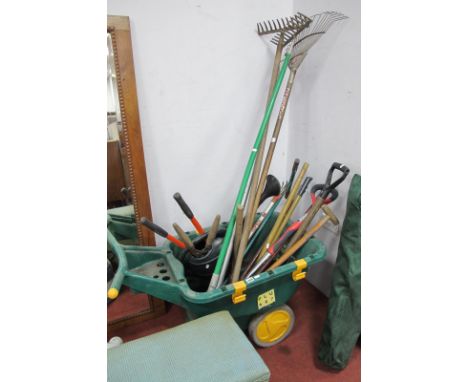 Green Plastic Wheelbarrow, quantity of garden tools including Spear &amp; Jackson fork, garden edger, hoe.