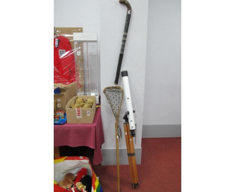 Lumex Telescope on Tripod, Lacrosse and Hockey sticks.