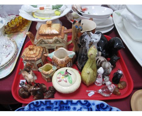 Beswick Fawn, (repair), four rabbits, Goebel 'Robin', Wedgwood bird paperweight, model cats, cottage tea ware, etc:- One Tray