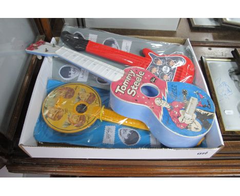 Selcol Vintage Tommy Steel Official Gitar, 52cm wide, two later Beatles Guitars in packs.