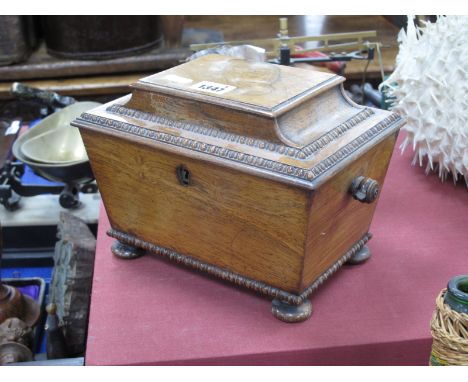 XIX Century Rosewood Tea Caddy, of sarcophagus form, with egg and dart decoration, liners and escutcheon absent, 24cm wide.