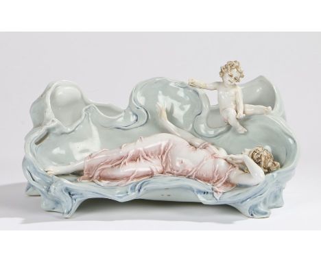 Art Nouveau porcelain planter, the shaped dish with raised depiction of a reclining lady and putto, 24.5cm wide 