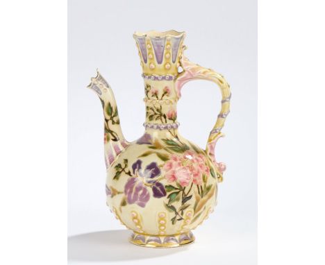 Zsolnay Hungarian porcelain ewer, with beaded neck, handle and spout above a floral decorated bulbous body, impressed and tra