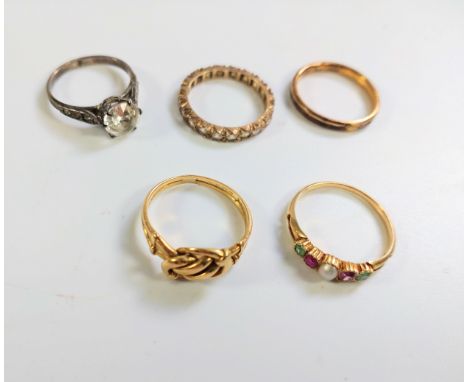 An Emerald and Ruby dress Ring, a high carat yellow metal dress ring. Sizes L and M. Together with three other costume rings,