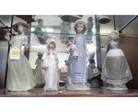 Three Lladro figures of girls 21cm to 29cm and a Nao figure of a young lady 25cm (4) 