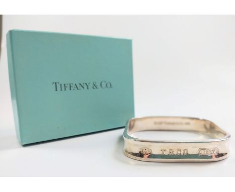 A Tiffany square shaped bangle with box. 