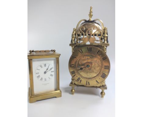 Two clocks. Comprising a carriage clock and lantern clock. 20th century. 