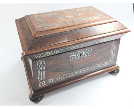 A Mid Victorian Rosewood and Mother of Pearl Inlaid Two Compartment Tea caddy. Circa 1850. On bun feet. 14cm x 23cm x 15cm. 