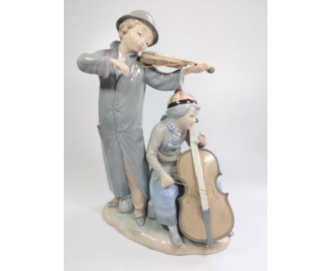 Nao boy violinist and girl double-bass players group 23cm wide by 33cm high. 