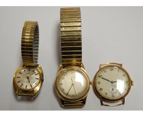 A gents 18ct gold cased manual wind wristwatch (lacking strap); a Crusader 9ct gold gents manual wind wristwatch on replaceme