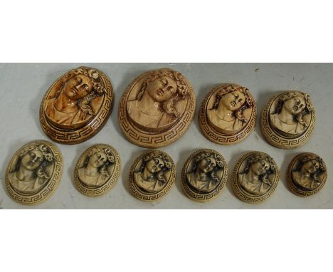 A collection of modern relief portrait plaques