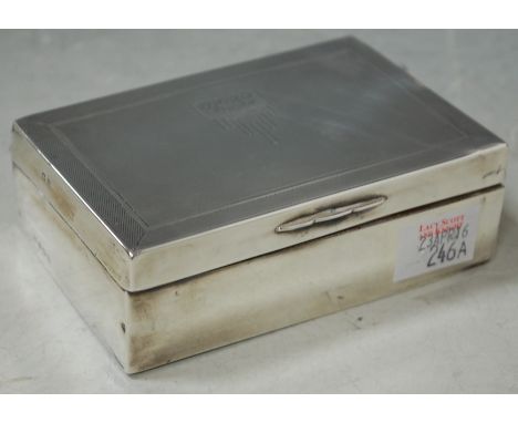 A George V silver table cigarette case of rectangular form with engine turned lid