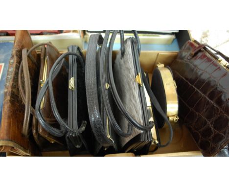 A ladies Golden Arrow leather handbag together with various other ladies' bags including a crocodile skin example