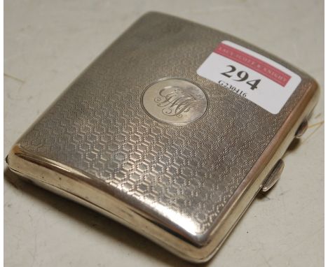 A mid-20th century silver pocket cigarette case, with all-over engine turned decoration and circular cartouche engraved with 