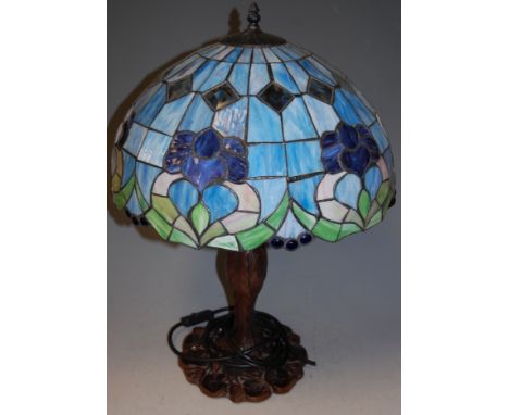 A Tiffany style bronzed metal table lamp