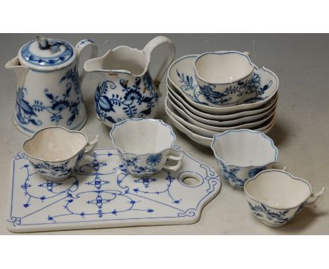 An early 20th century Meissen porcelain blue & white part tea service in the Onion pattern