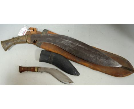 An early 20th century kukri in associated leather scabbard; together with another kukri (2)  Condition Report / Extra Informa