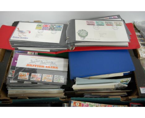 A box of assorted first day covers, dating mainly from the 1960s onwards