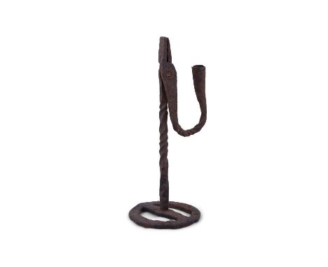 A FORGED IRON RUSH LIGHT, the turned centre pillar on circular base with turned and curved handle. 26cm highProvenance: Priva