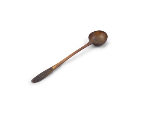 A 19TH CENTURY WORKED HORN LADLE, with taper handle and shell shaped base. 35cm longProvenance: Private Collection, Wexford