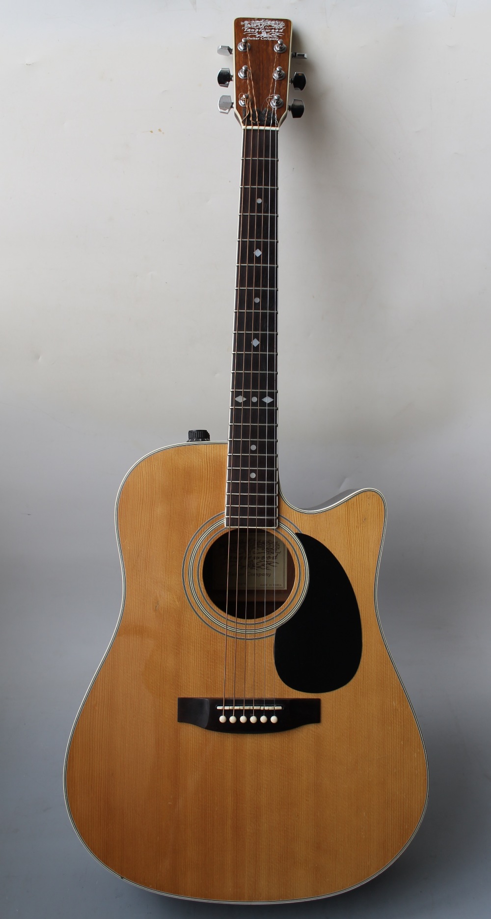 A TANGLEWOOD TFCA-E ELECTRO-ACOUSTIC GUITAR, made in Korea, with a ...