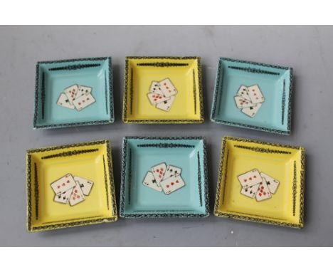 A SET OF SIX SMALL ENAMEL PIN TRAYS, depicting playing cards, marked 'Bilston and Battersea Enamels, Designed by Halcyon Days