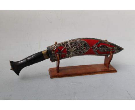A MODERN GURKHA TYPE KNIFE, the scabbard decorated with a white metal fretwork cage, depicting a Gurkha soldier and the cross