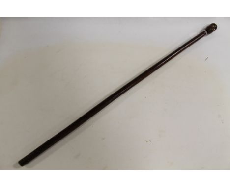 A 19TH CENTURY SOUTH AFRICAN ZULU WALKING STICK, with carved headBuyers - for shipping pricing on this lot, visit www.cuttles
